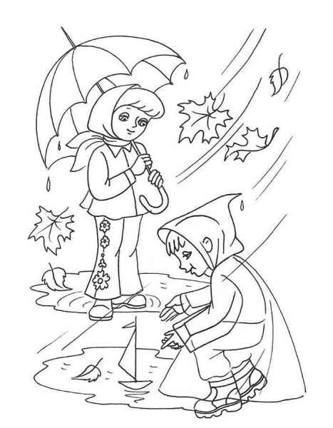 Мальчик и девочка запускают кораблик под дождем